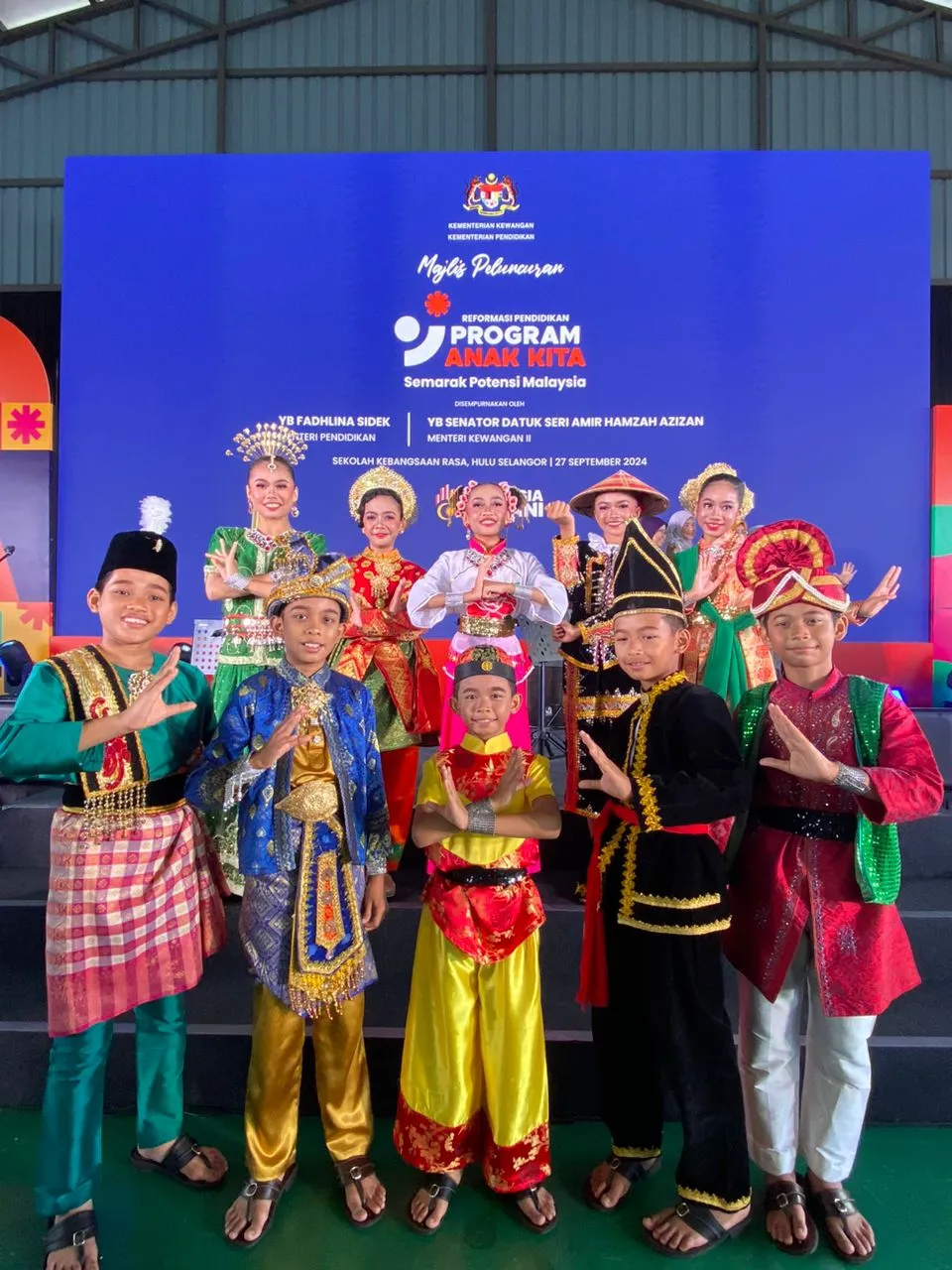 Performers in traditional dress at the Program Anak Kita launch