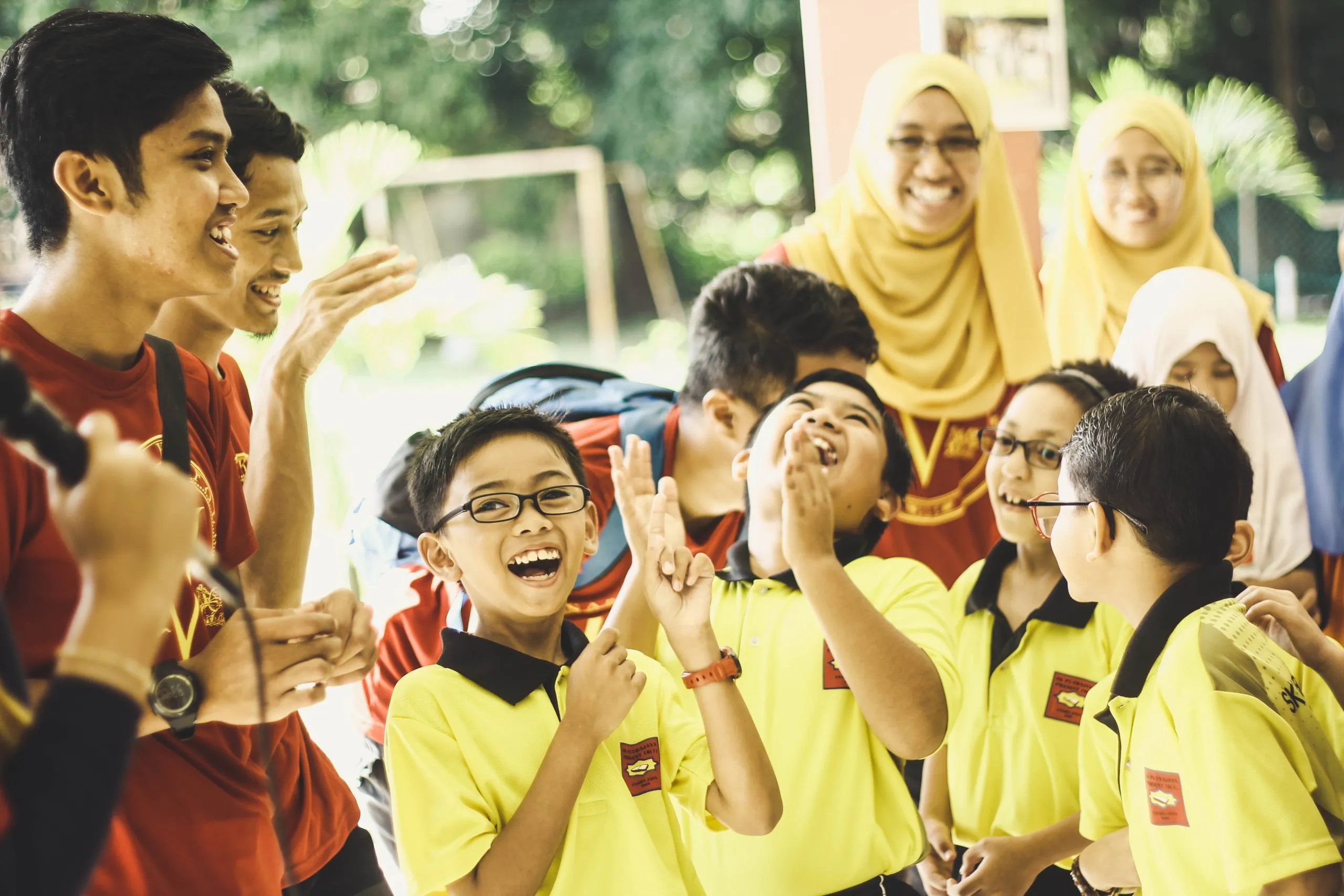 Secondary school pupils laughing together